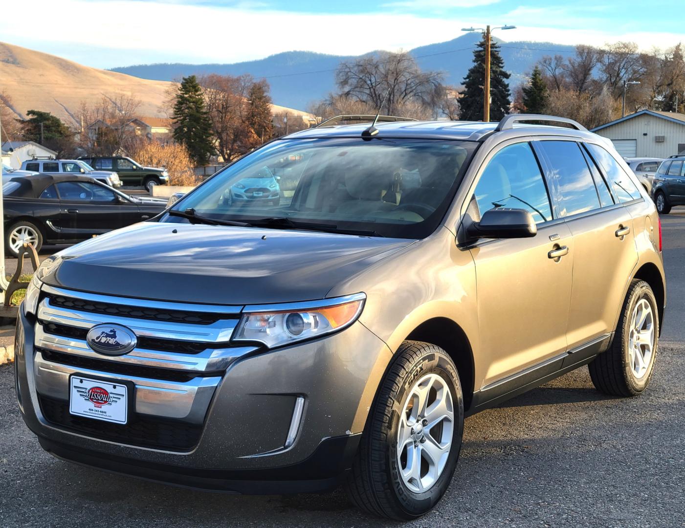 2013 Grey /Gray Ford Edge SEL (2FMDK4JC9DB) with an 3.5L V6 engine, 6-Speed Automatic transmission, located at 450 N Russell, Missoula, MT, 59801, (406) 543-6600, 46.874496, -114.017433 - Photo#1